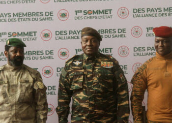 Heads of state of Mali's Assimi Goita, Niger's General Abdourahamane Tiani and  Burkina Faso's Captain Ibrahim Traore pose for photographs during the first ordinary summit of heads of state and governments of the Alliance of Sahel States (AES) in Niamey, Niger July 6, 2024. REUTERS/Mahamadou Hamidou